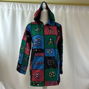 Vibrant Patchwork Hoodie with Artistic Design